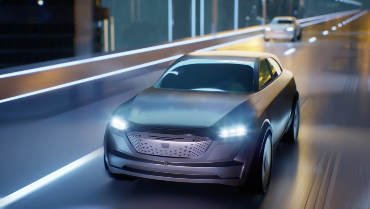 metallic gray car running on the road