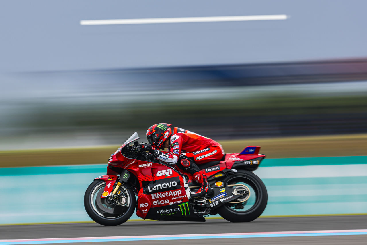 racing motorbike while negotiating a curve