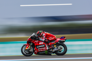 racing motorbike while negotiating a curve